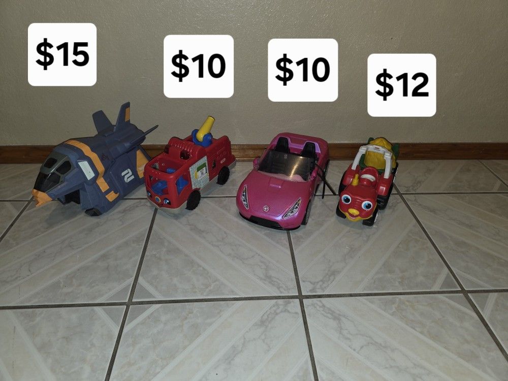 Disney/Pixar Buzz Lightyear movie The Amarillo Vehicle
Barbie Convertable
Little People Tow 'n Pull Tractor & Helping Others Fire Truck.