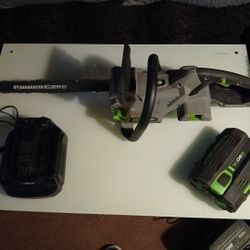 EGO ELECTRIC CHAINSAW  56V  5.0AH 18 INCH BAR  CHARGER AND BIG BATTERY  INCLUDED