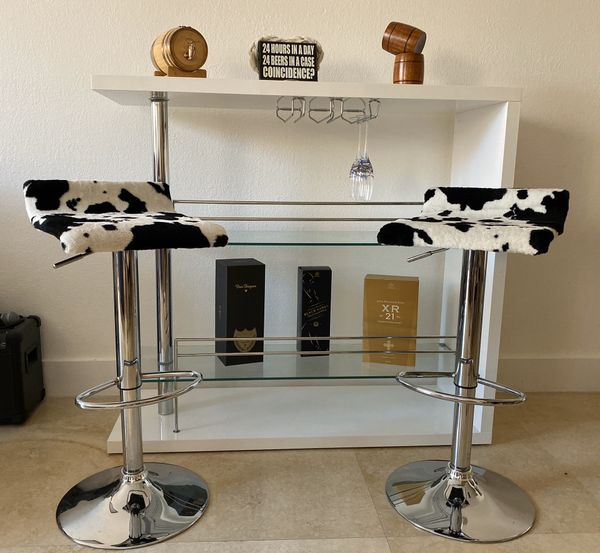 Cow print modern swivel bar stools with adjustable height, foot rest and stainless steel base 