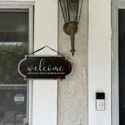 welcome let’s talk about horror movies wooden sign