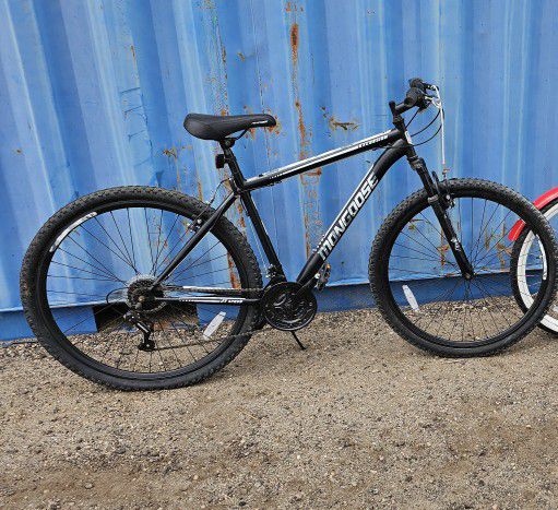 1 Mongoose Mountain Bike, 1 Dunlop Suburban Leisure Bike