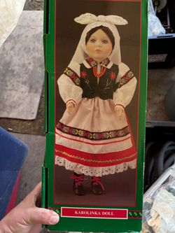 House of Lloyd Christmas Around the World porcelain dolls