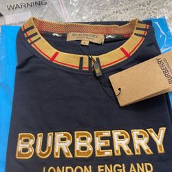 New designer Tees Size L