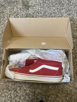 Red Vans High tops