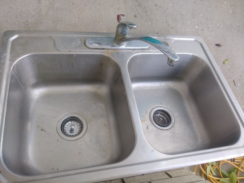 Stainless steel sink and facet