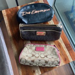 Michael Kors And Coach Makeup Bags