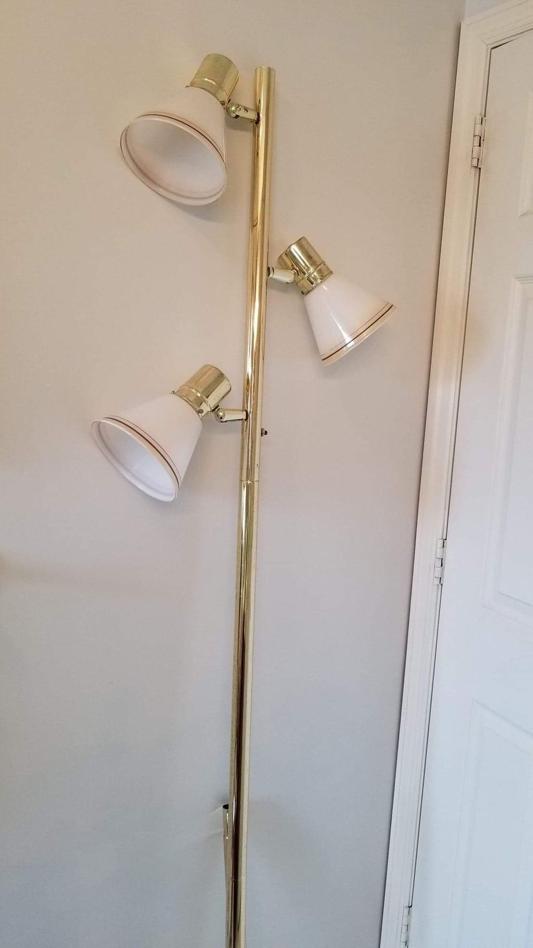 1960’s pole lamp . Unfortunately all 3 shades got broken. Shades can be bought online. $8