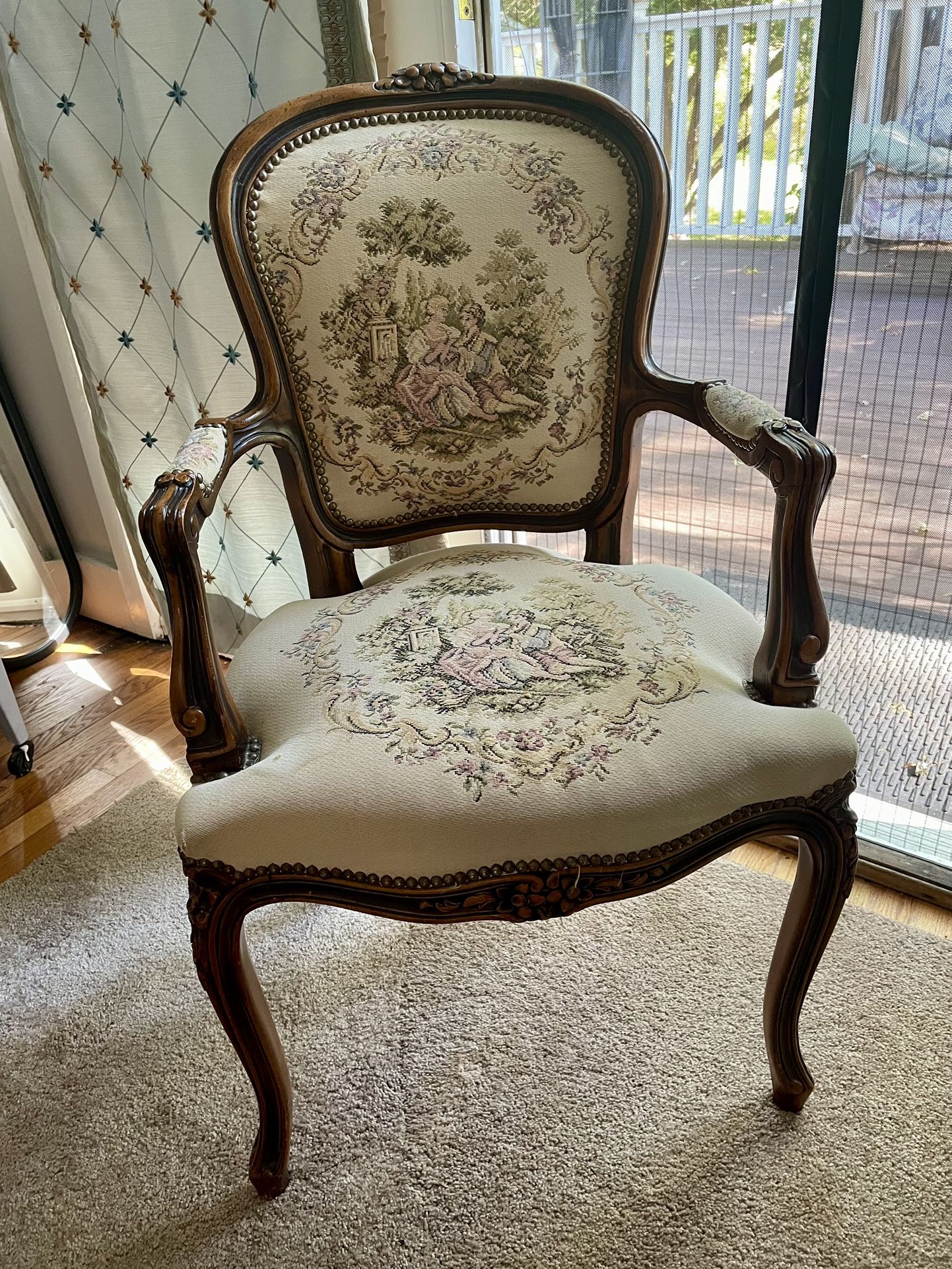 Antique romantic tapestry sitting chair.