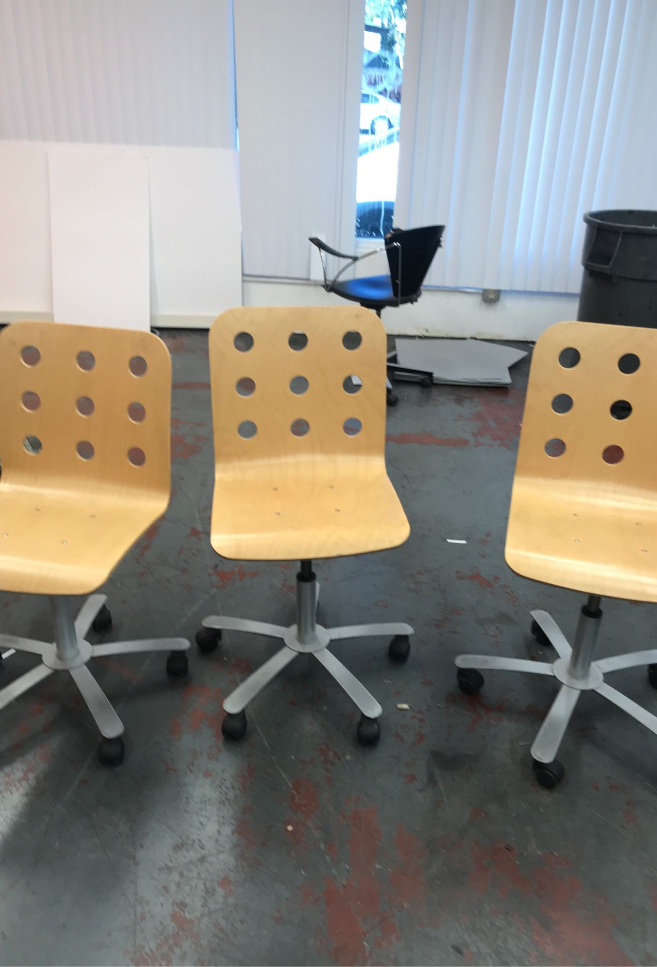 Three office chairs with hydraulics