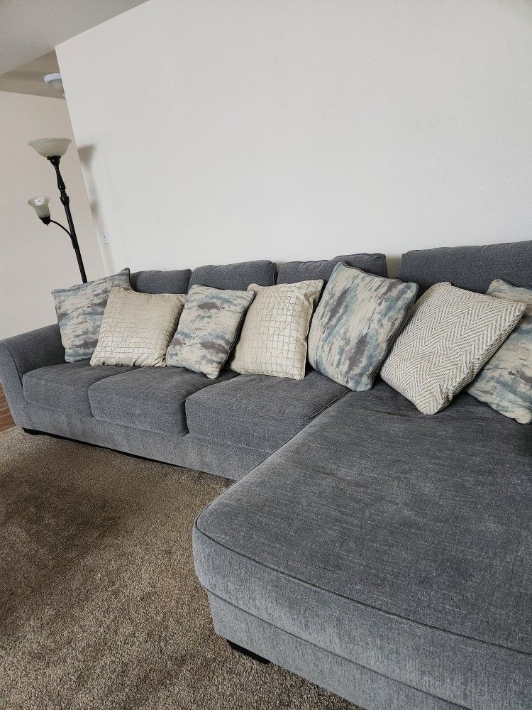 L Shaped Couch with Pillows 