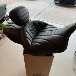 Extended reach seat for touring trike and road glide street glide