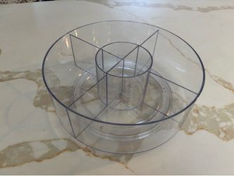 Clear spinning makeup organizer