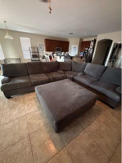 Large grey sectional couch