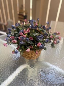 Artificial flowers in a basket