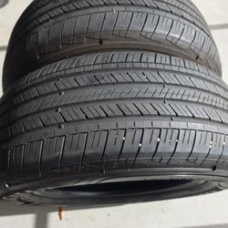 Goodyear In Used Condition One Tire Has A Patch In It It Holds Air Two Tires 245 60 18.    60% Tread