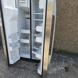 general Electric Double Door Stainless Steel Refrigerator.