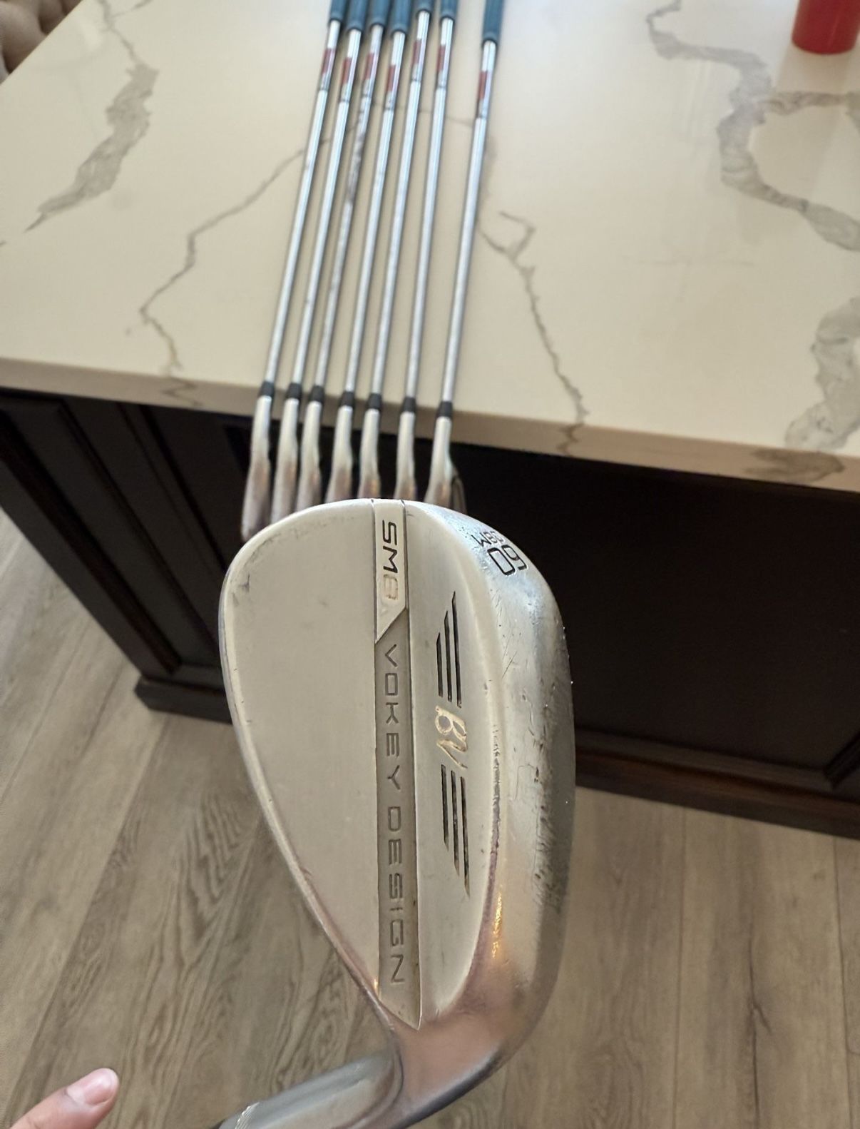 TaylorMade P(contact info removed) Iron Set (4-PW) + Titleist Vokey 60° Wedge
