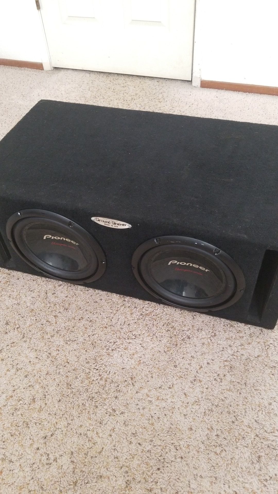 2 Pioneer Champion Series 10 " subwoofers in a Ground Shaker duel ported box