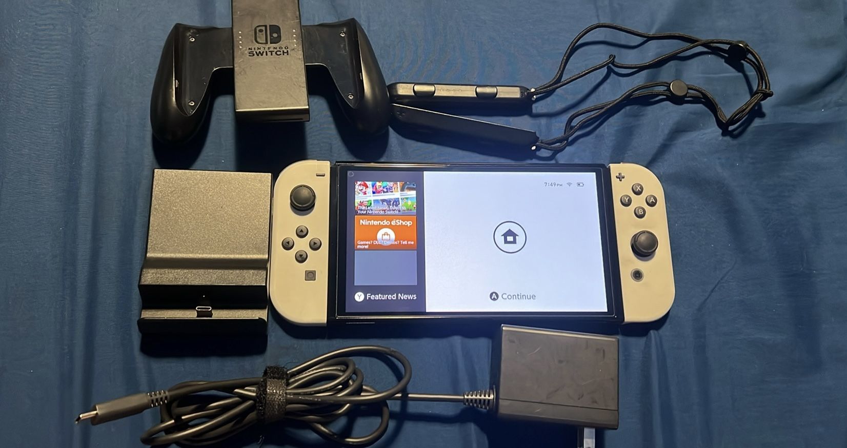 Nintendo switch oled with docking station and joycon grip