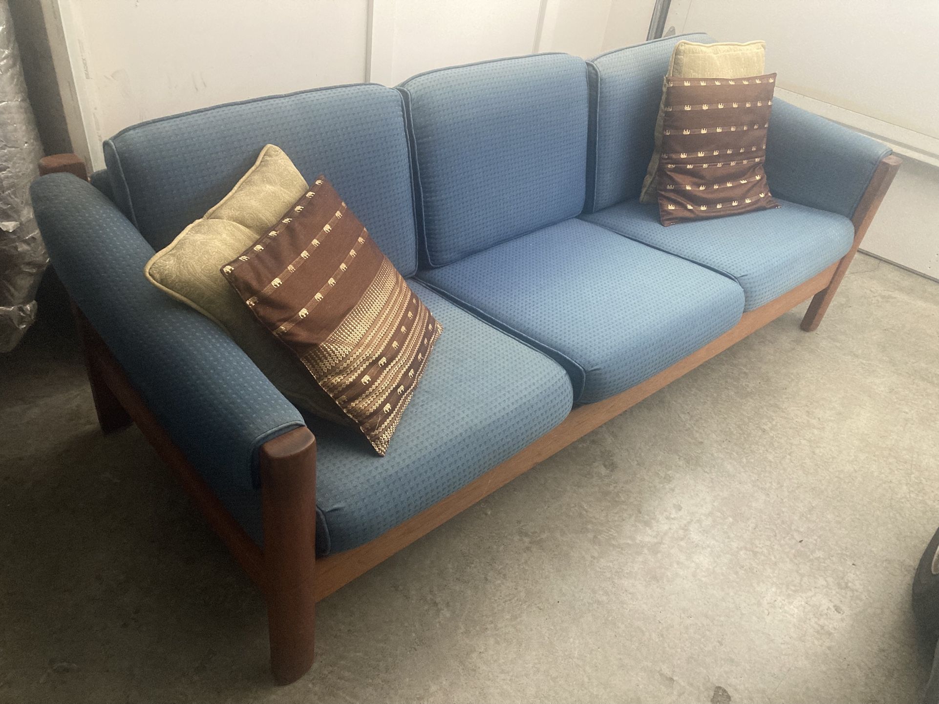 Blue fabric sofa with teakwood fram