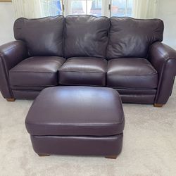 Luxurious Burgundy Leather Couch With Ottoman