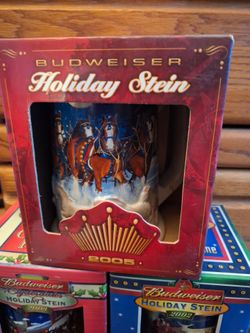 SET OF 3 ...BUDWEISER HOLIDAY STEINS $40 OBO
