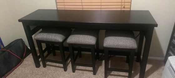 4Pc Black Sofa Table and Cushioned Stools