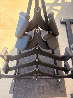 Durable steel cable machine attachments with a black textured rubber coating.