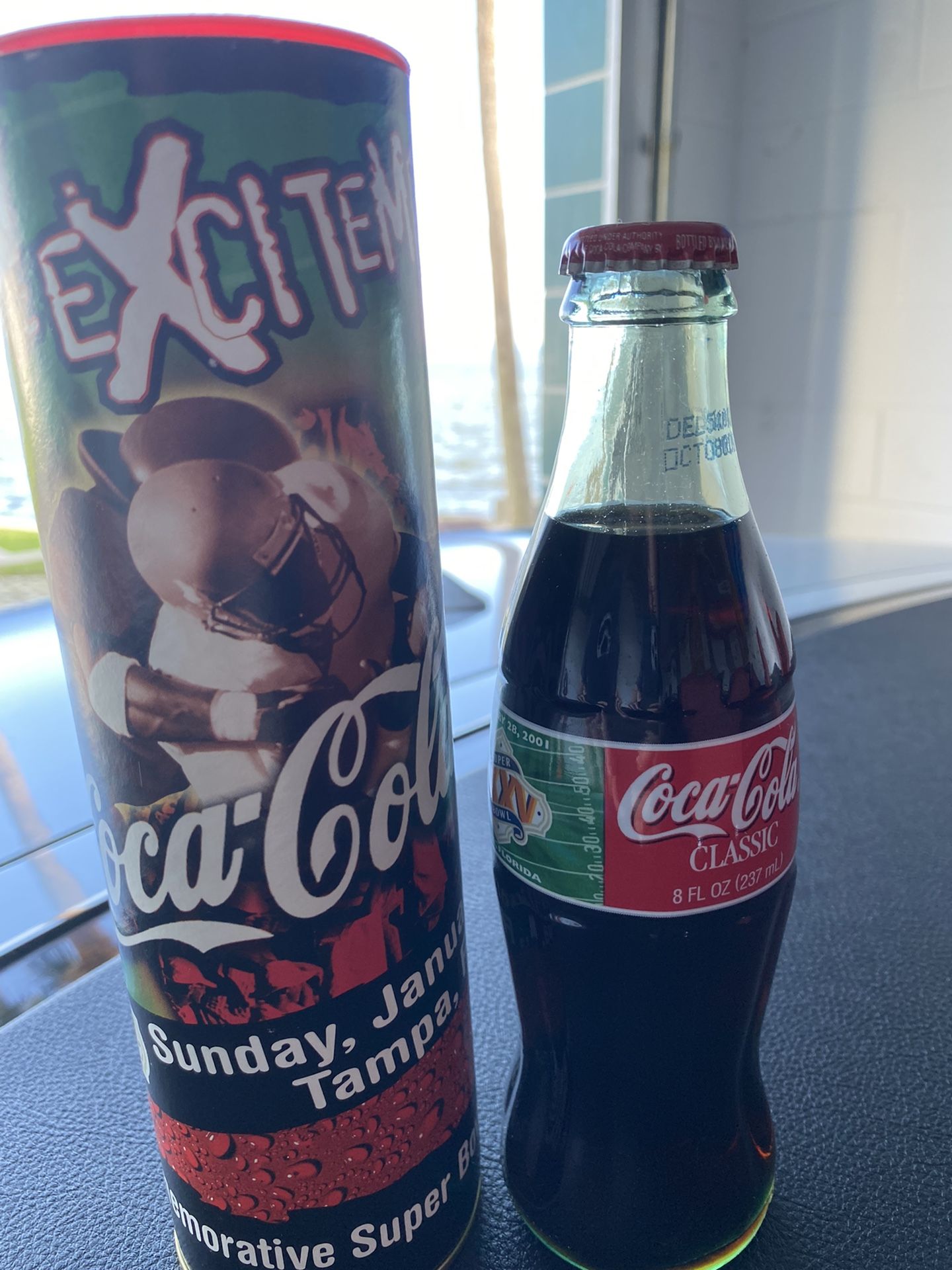 A Total Of 24 Super Bowl XXXV Collective Bottles In Commemorative Case