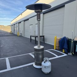 Propane Patio Heater with Push Button Ignition and Wheels comes with empty propane tank 