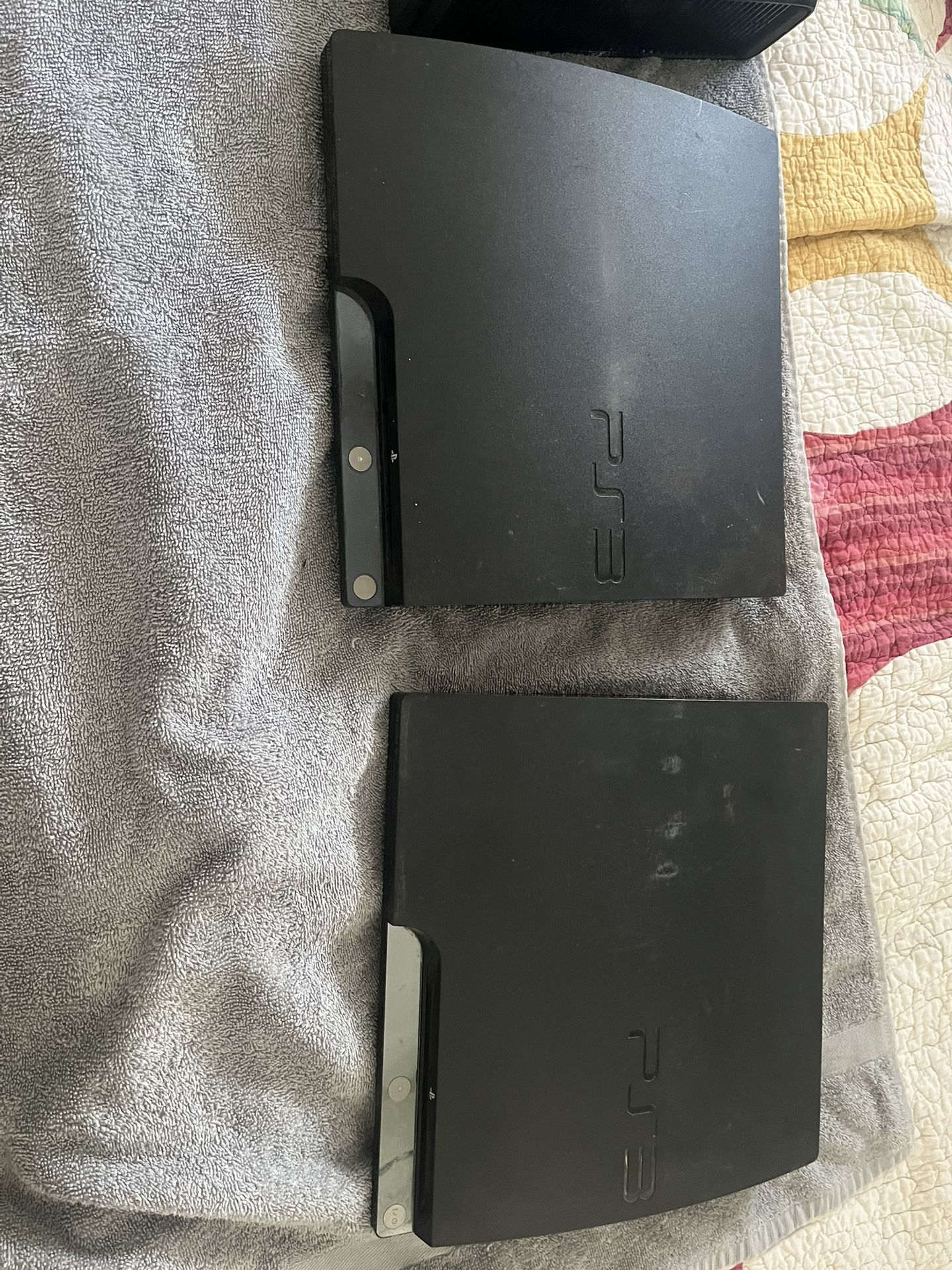 Two Play Station 3’s One Now 360 With PS3 And Xbox 360 Games And 3Controllers For Now 360 They Need Power Cords All Do Work Had Tested At Game Shop $