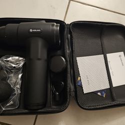 Massage gun with case and attachments