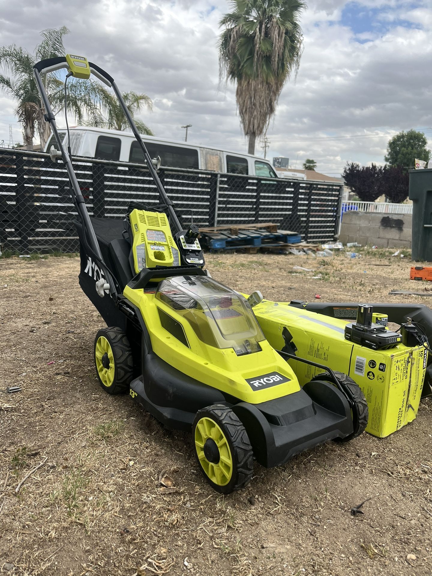 13-inch lawnmower and weed whacker combo with battery and charger