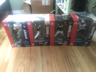 4 brand new in Box football NFL statue 12 inch randy moss and more