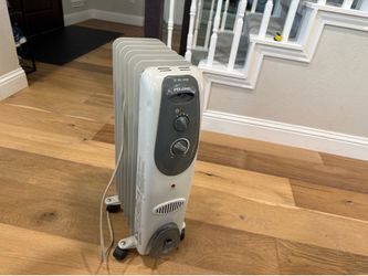 Pelonis oil-filled radiator heater on wheels