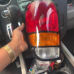 Left Head Rear Light Mazda B2(contact info removed)