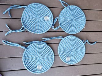 14 in round braided chair pads.. NEW WITH TAGS!