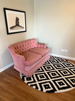 Two fabulous vintage pink couches