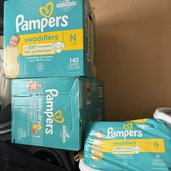 Baby Items  ) diapers and newborn clothes