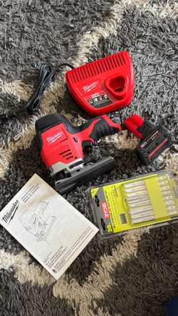 New Milwaukee M12 Jigsaw with 6.0 battery, charger and blades