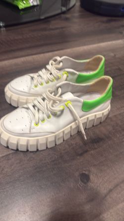 White Low-Top Sneakers with Neon Green Accent