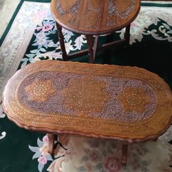 2 Tables made of natural carved wood inlaid with copper made in India