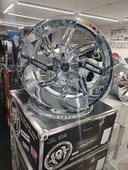 Chrome 26x12 6 lug universal with mud tires. $10 take home layaway. Ulohos 2940 N Keystone M-Sa 10-6