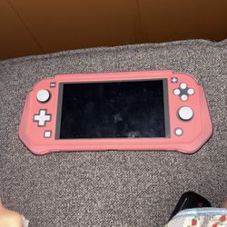Nintendo switch lite in GREY  With Pink Case