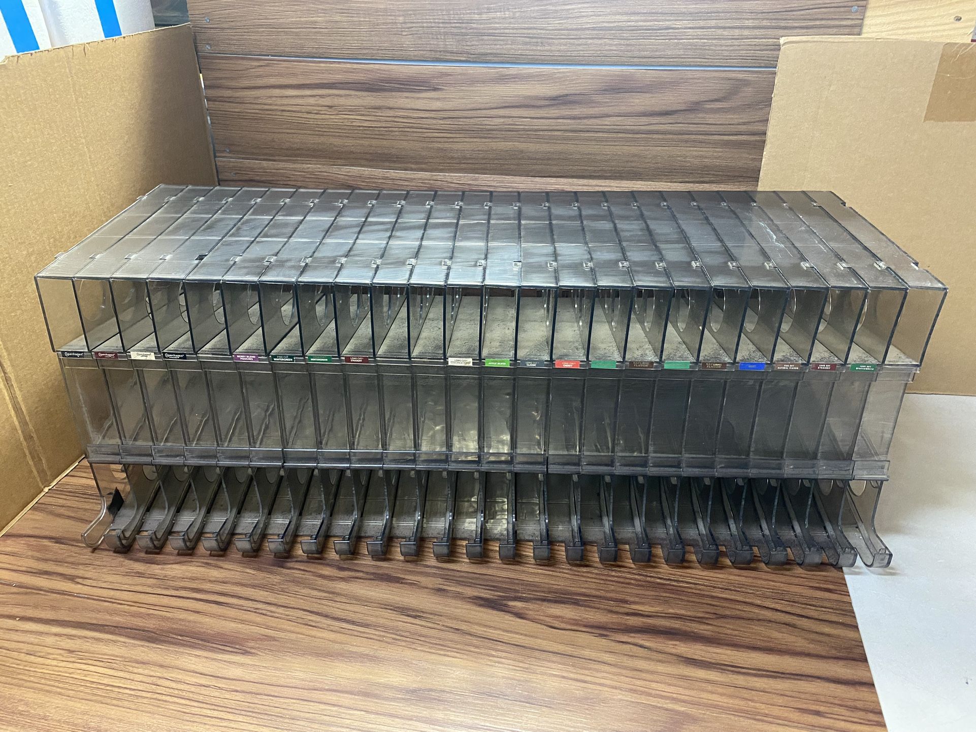 DISPLAY RACK for chewing tobacco. Holds normal cans of snuff and any other kind of rolling cans of tobacco. 24 slots, each slot holds 10 cans. 240 tot
