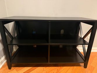 Oxford 16 inch black wood TV stand- This black Convenience Concepts Oxford TV stand features open shelving and a distinct X-shaped side frame design $