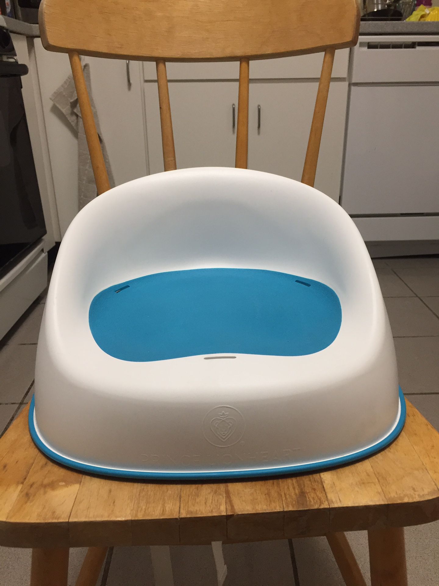 Dining booster seat - drop off available (depending on location)