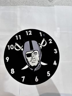 Raiders Clock Metal Sign 14in Black Background Wall Decor