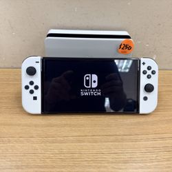 NINTENDO SWITCH OLED CONSOLE W/WHITE JOY-CONS & POWER CABLES,HDMI, AND CHARGING DOCK