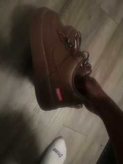 brown supreme size 9.5